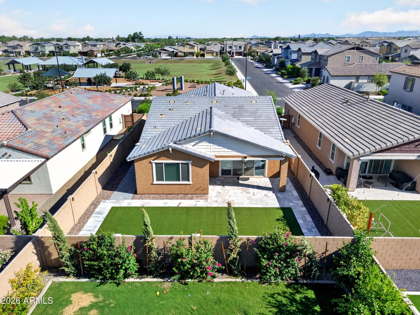 Rear aerial view of 2313 E Castanets Drive and the park-front Belrose setting